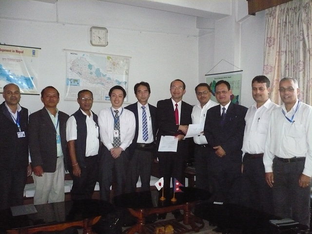 Photo 1. Director General-designate of Central Bureau of Statistics (CBS), Nepal signed on to the Minutes of the detailed plan of the Project.