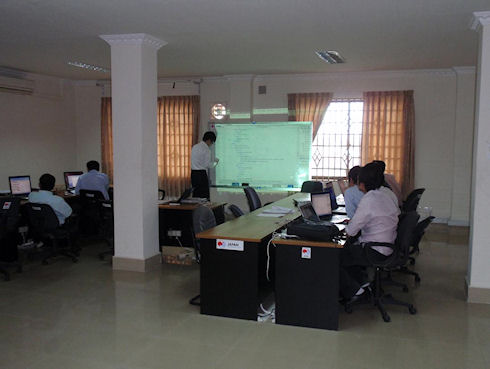 Photo 2. JICA Expert, the officer of the National Statistics Center,
      delivers a lecture on Establishment Listing Data Processing to NIS staff.