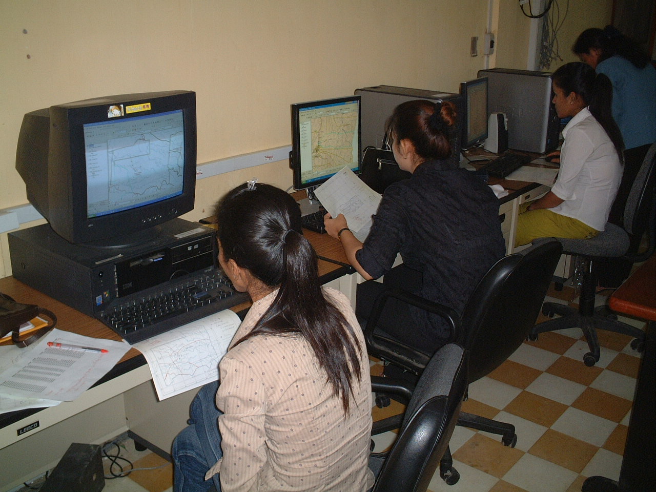 Photo1. Digitizing Village Boundaries by NIS staffs