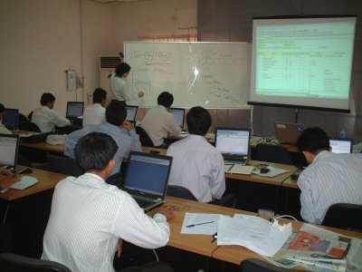 Photo 1. JICA Expert, the officer of the National Statistics Center, delivers a lecture on EXCEL VBA to line ministries.
