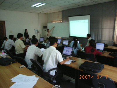 Photo 1. NIS officer who trained in Japan this year under the Project delivers a lecture on EXCEL VBA to NIS staff.