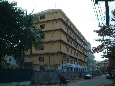 Photo 1. The interior decorating of the six-story building is under construction.